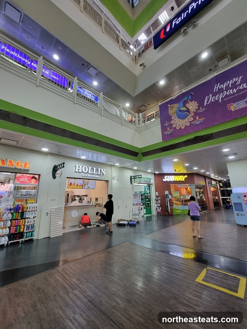 Indoor shopping mall with various shops