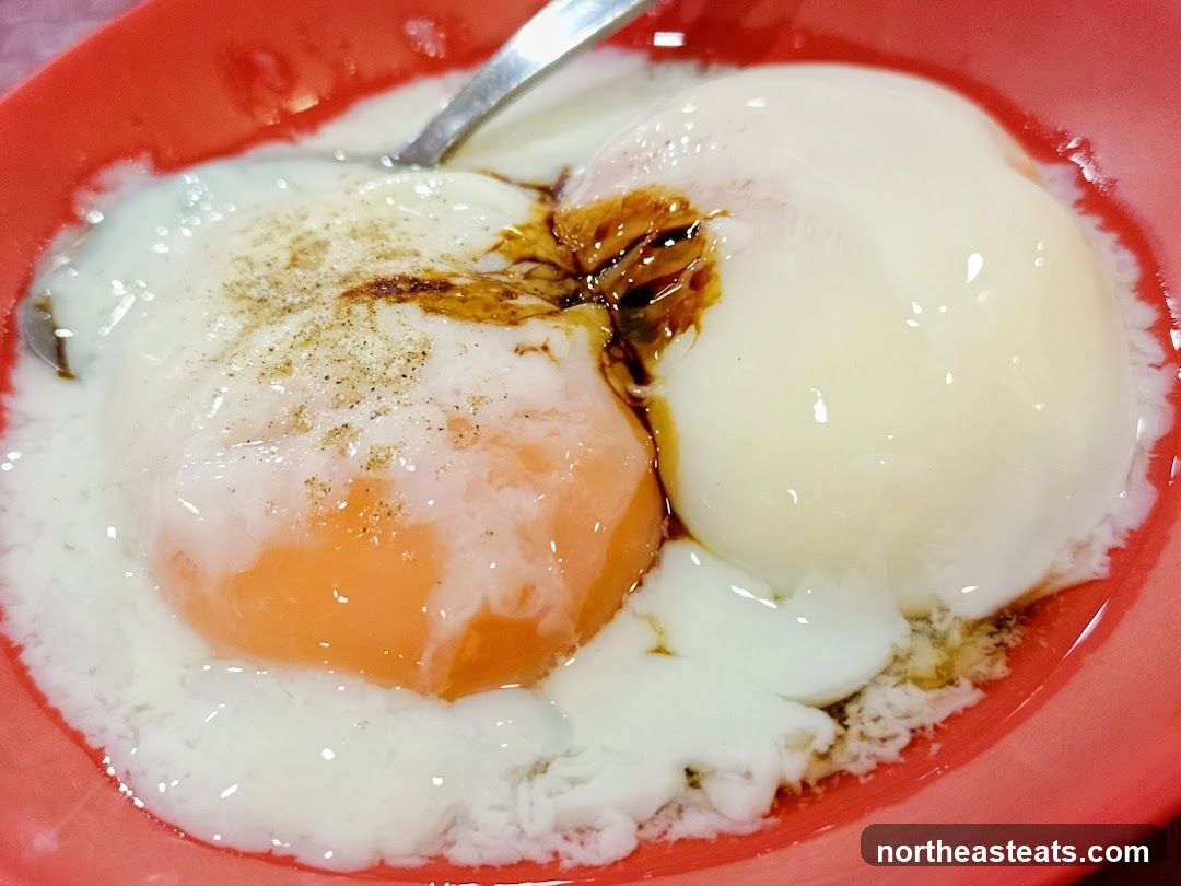 Soft-boiled eggs with soy sauce and pepper