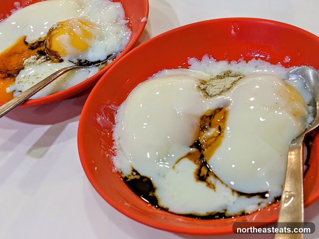 Soft-boiled eggs with soy sauce and pepper