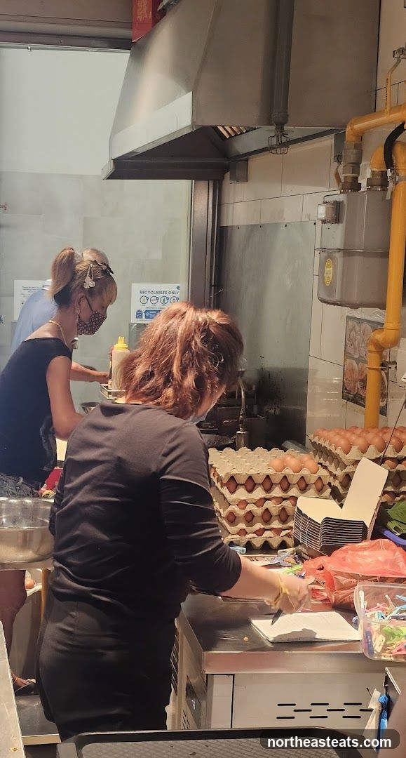 Kitchen Staff Preparing Food
