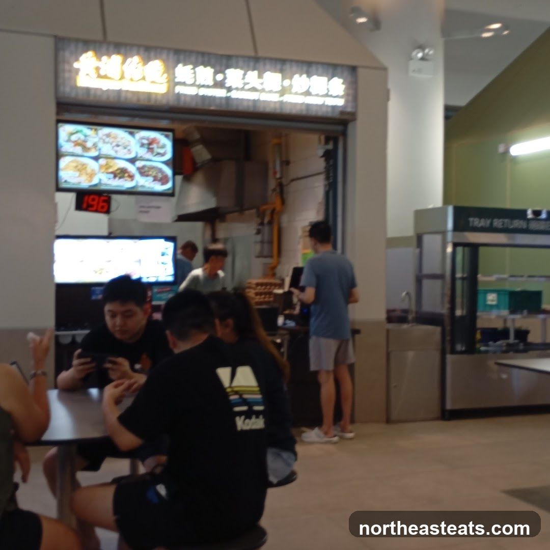 Food court stall with patrons