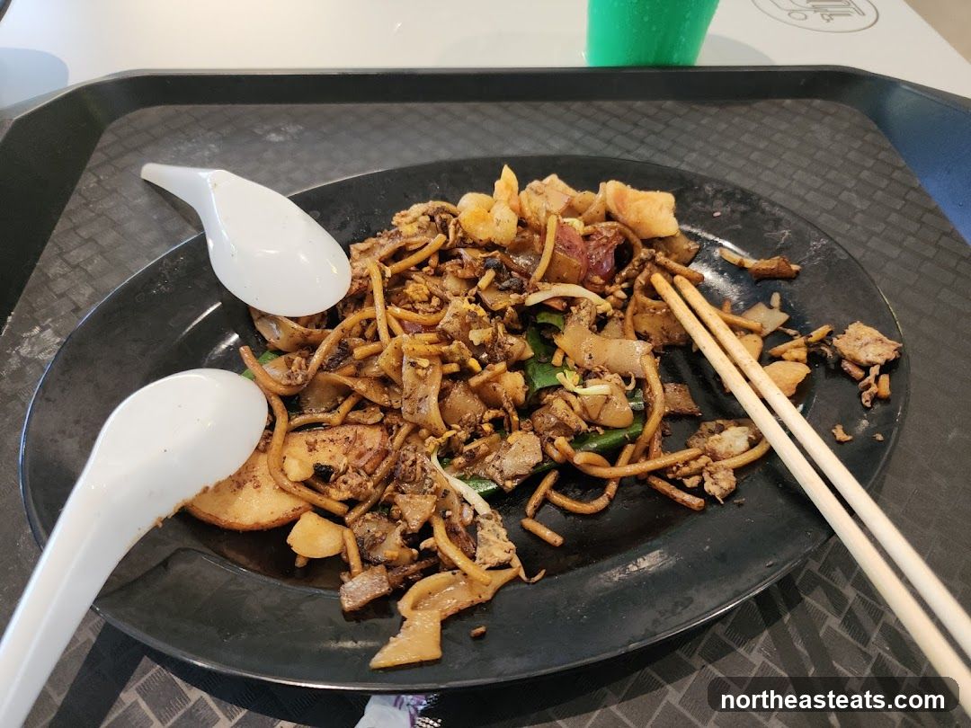 Noodles with Chopsticks and Spoons
