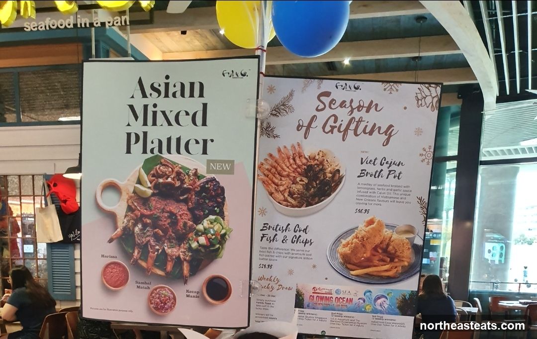 Promotional posters for seafood dishes