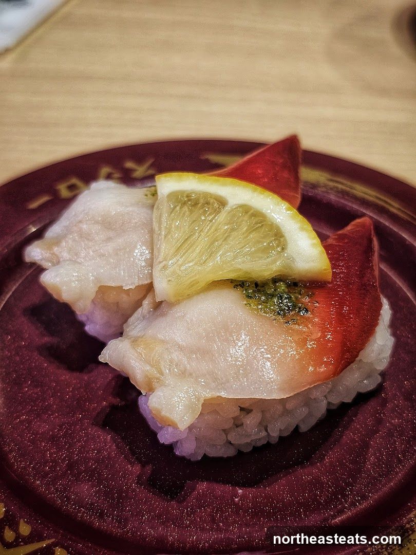 Sushi with Lemon and Red Topping