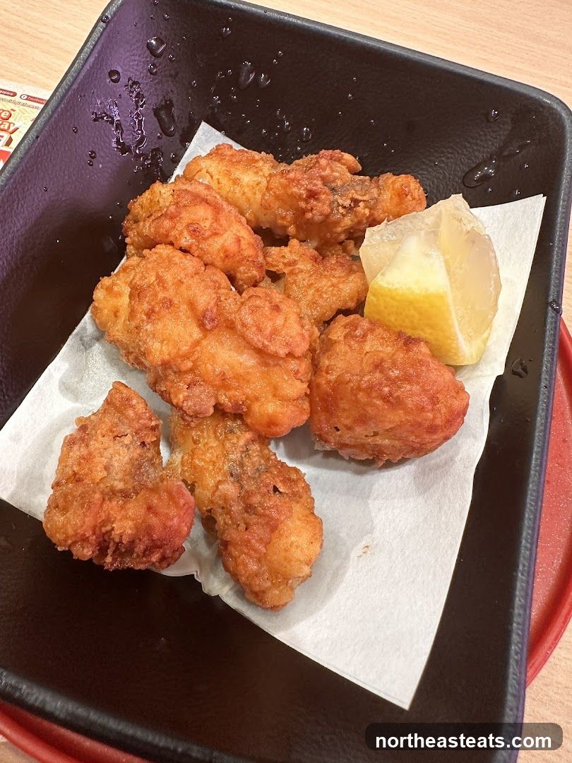 Fried Chicken Pieces with Lemon Wedge