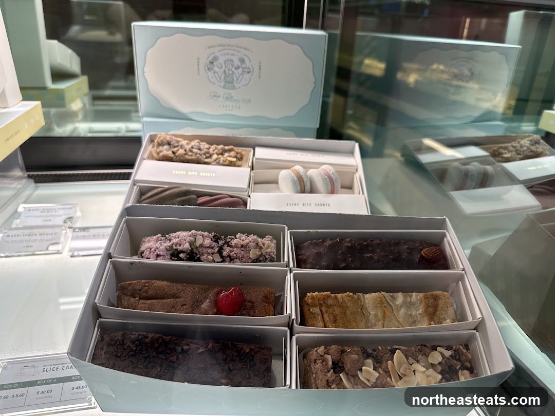 Assorted Sliced Cakes and Macarons