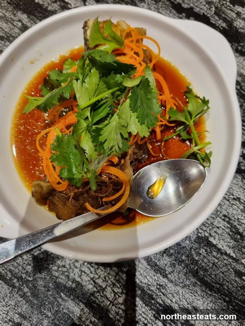 Fish dish with sauce and garnish