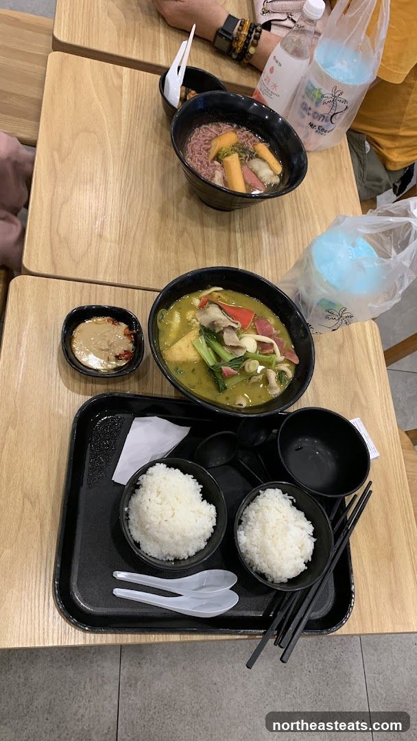Two bowls of noodles and rice