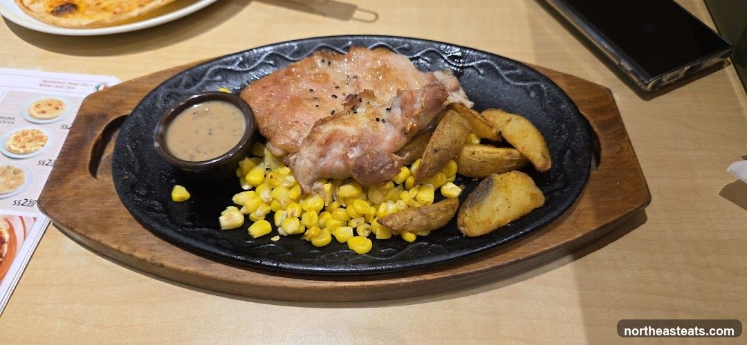 Chicken steak with corn and potatoes