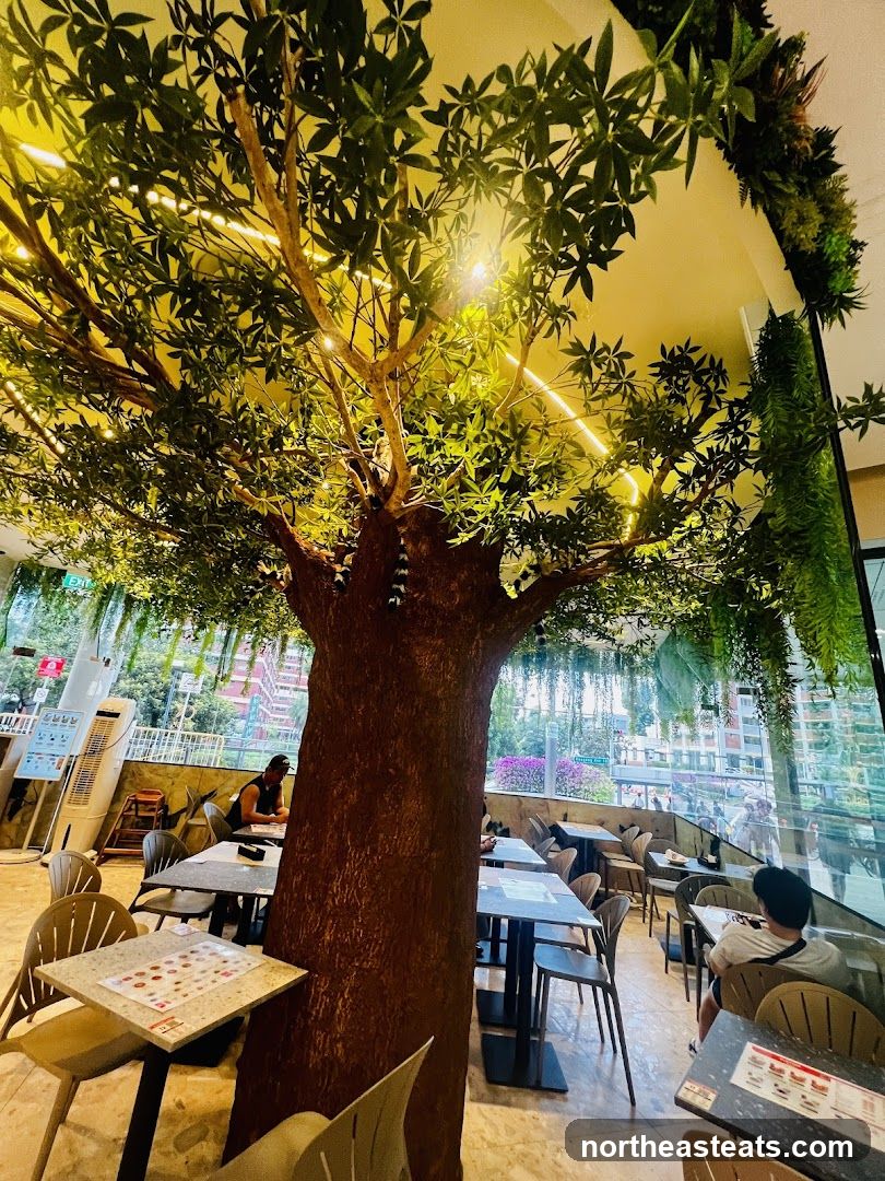 Restaurant Interior with Artificial Tree
