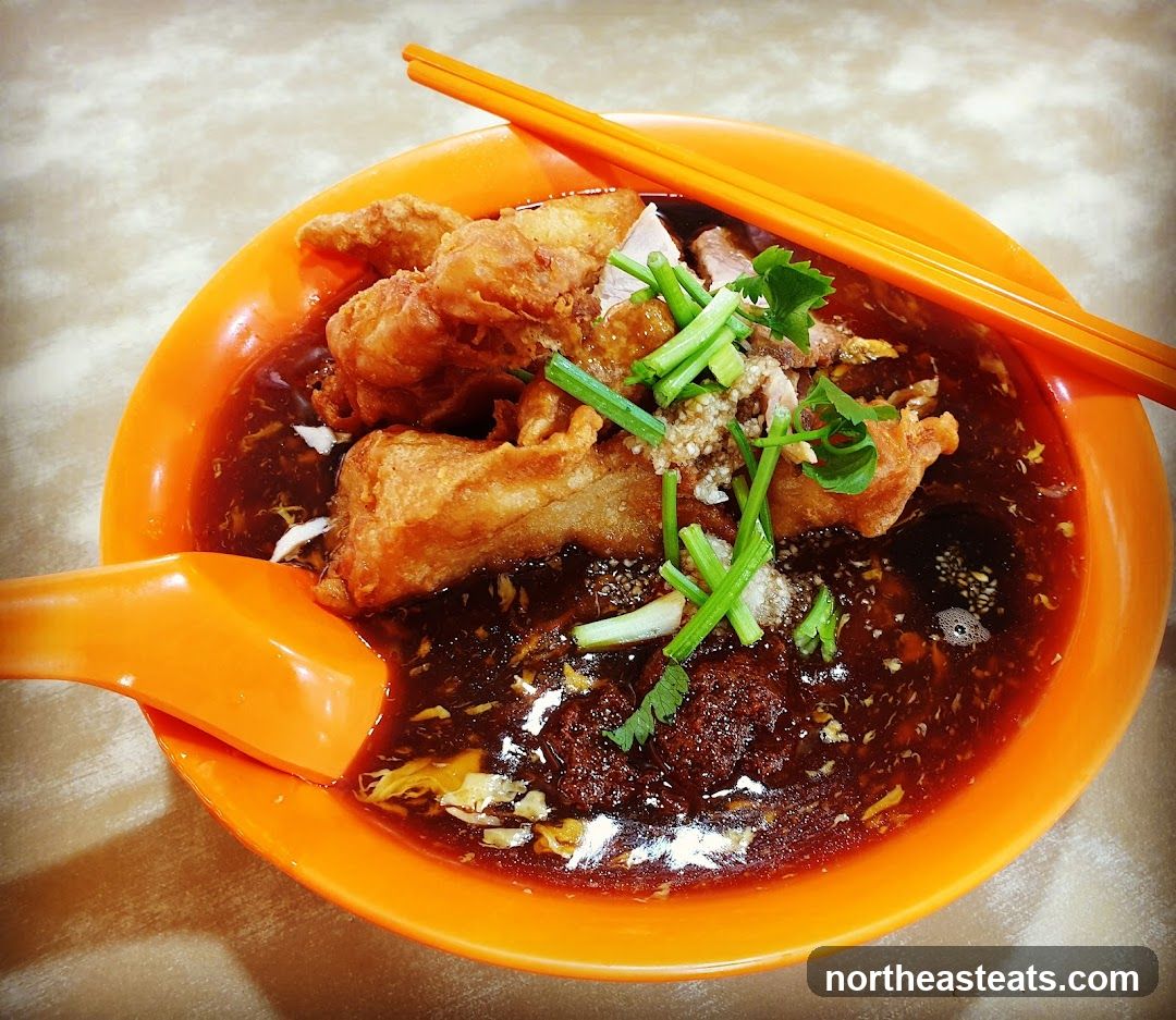 Bowl of Noodles with Fried Fish