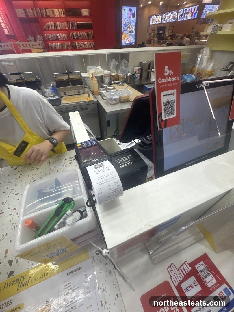 Counter with payment terminal and menu