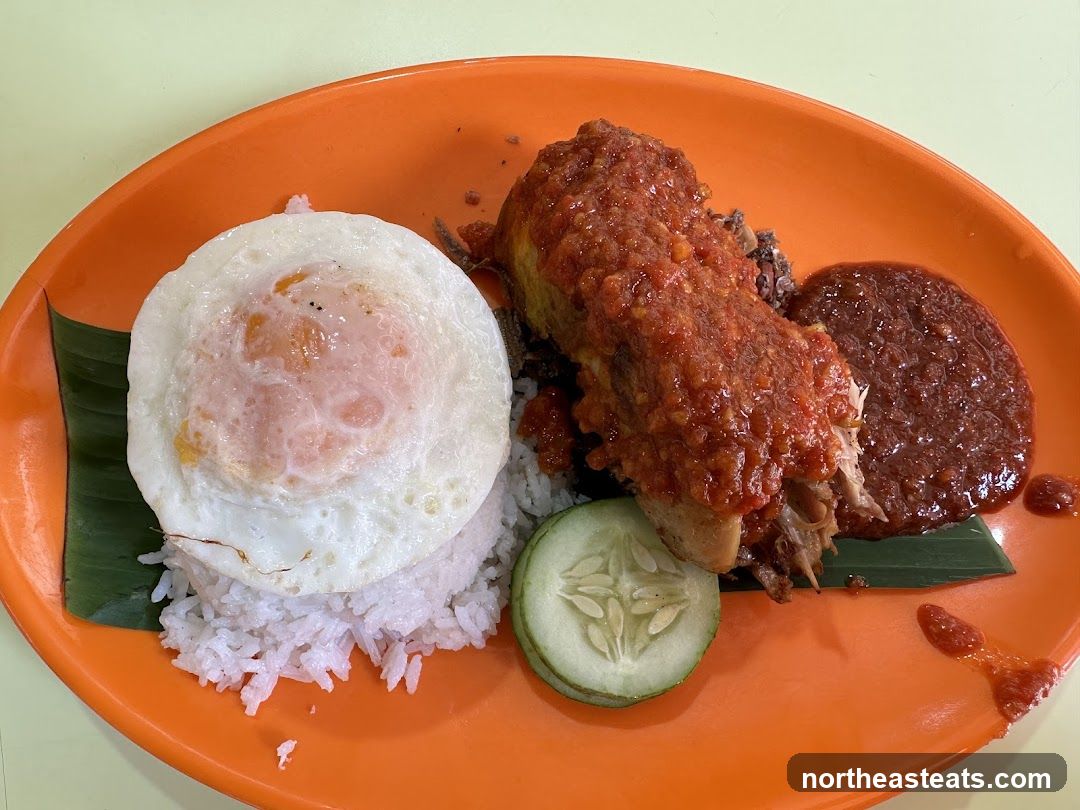 Nasi Lemak with Fried Egg and Chicken