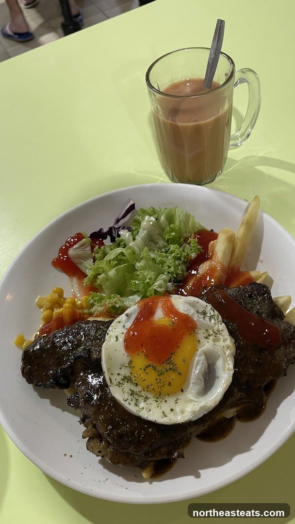 Steak with Fried Egg and Fries