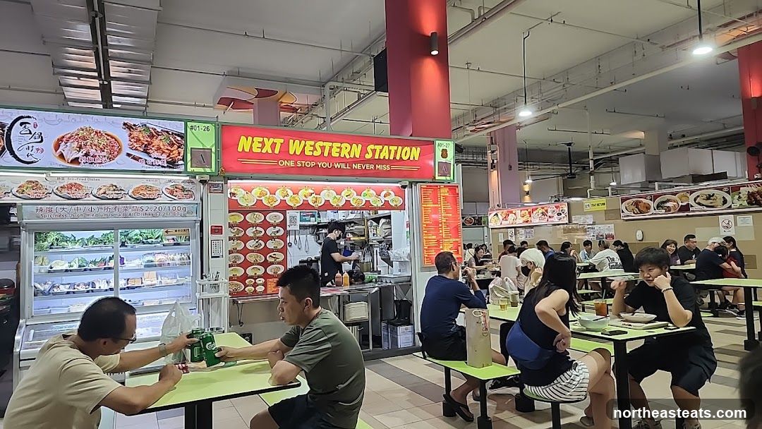 Food court with various stalls and diners