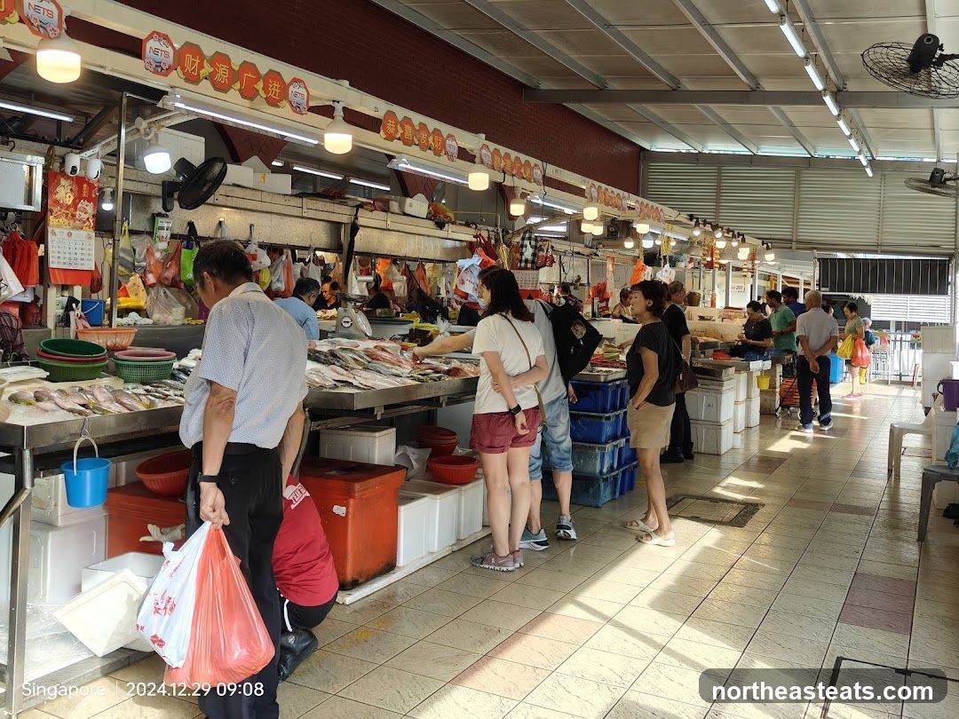 Busy Wet Market with Fish Stalls