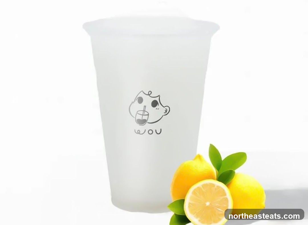 Frosted cup with cartoon logo and lemons
