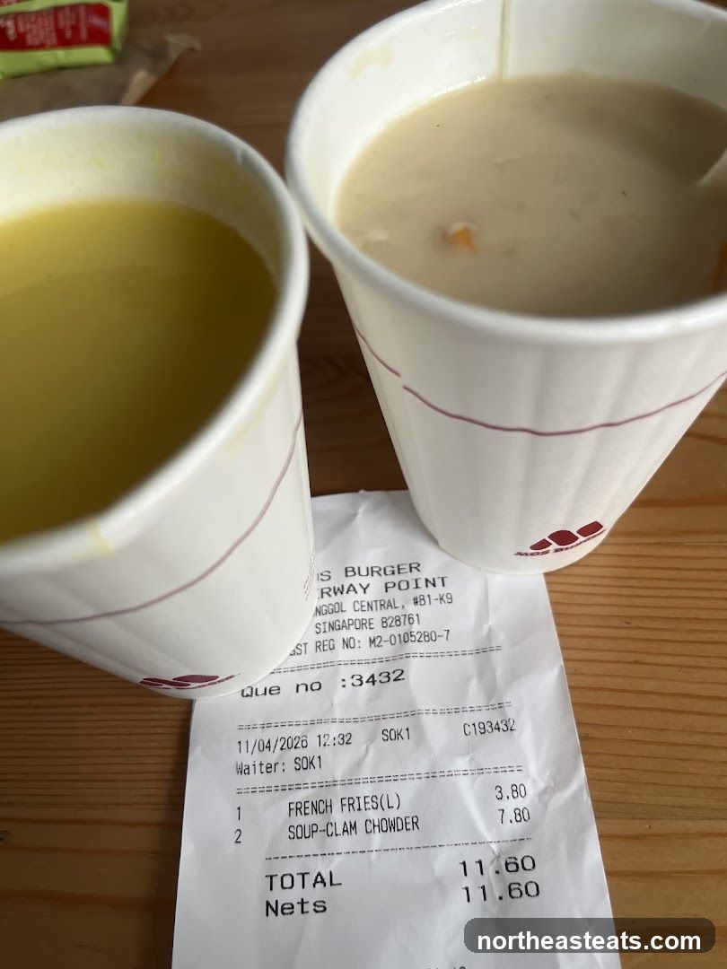 Two cups of soup and a receipt