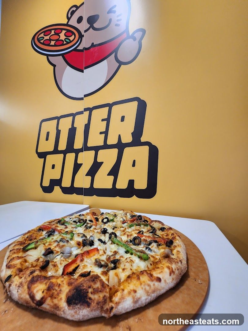 Pizza with Otter Pizza Logo