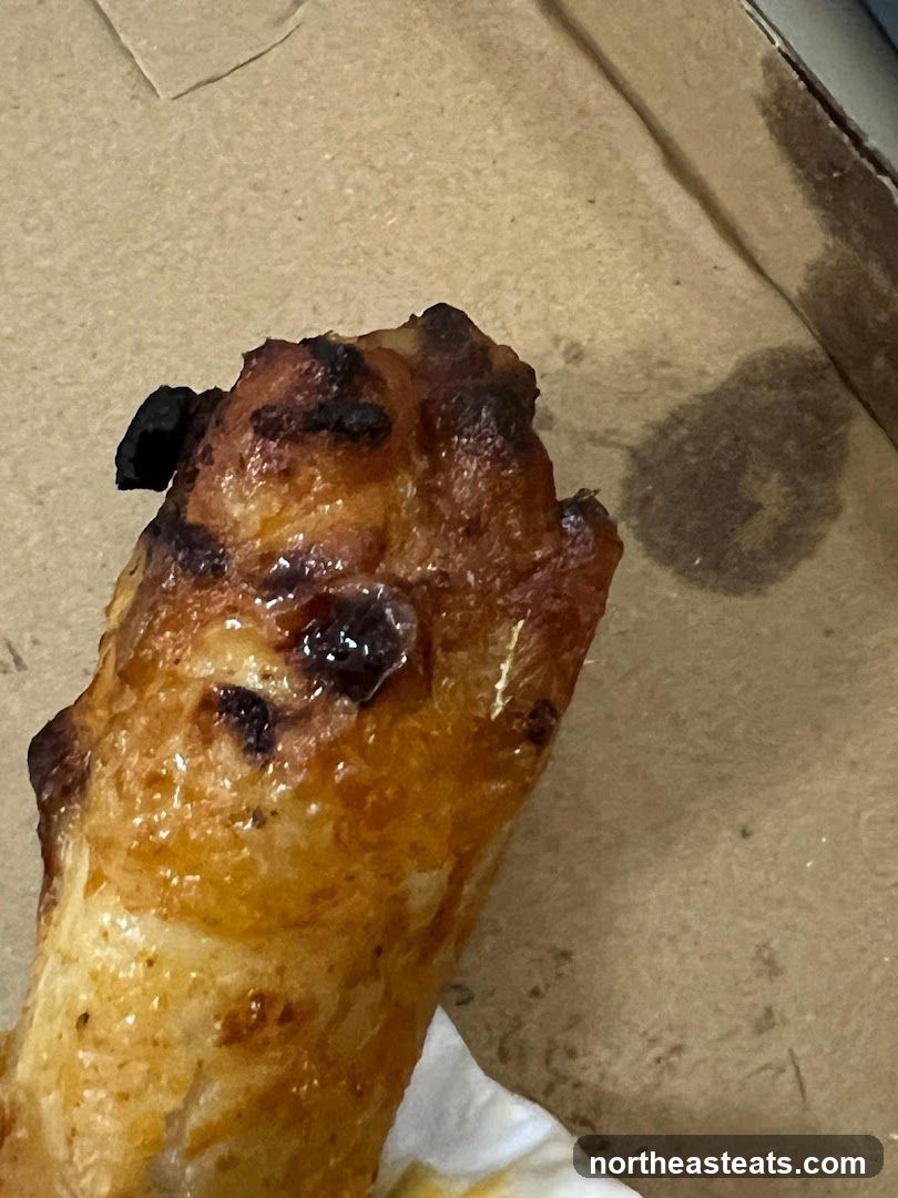 Close-up of a cooked chicken wing