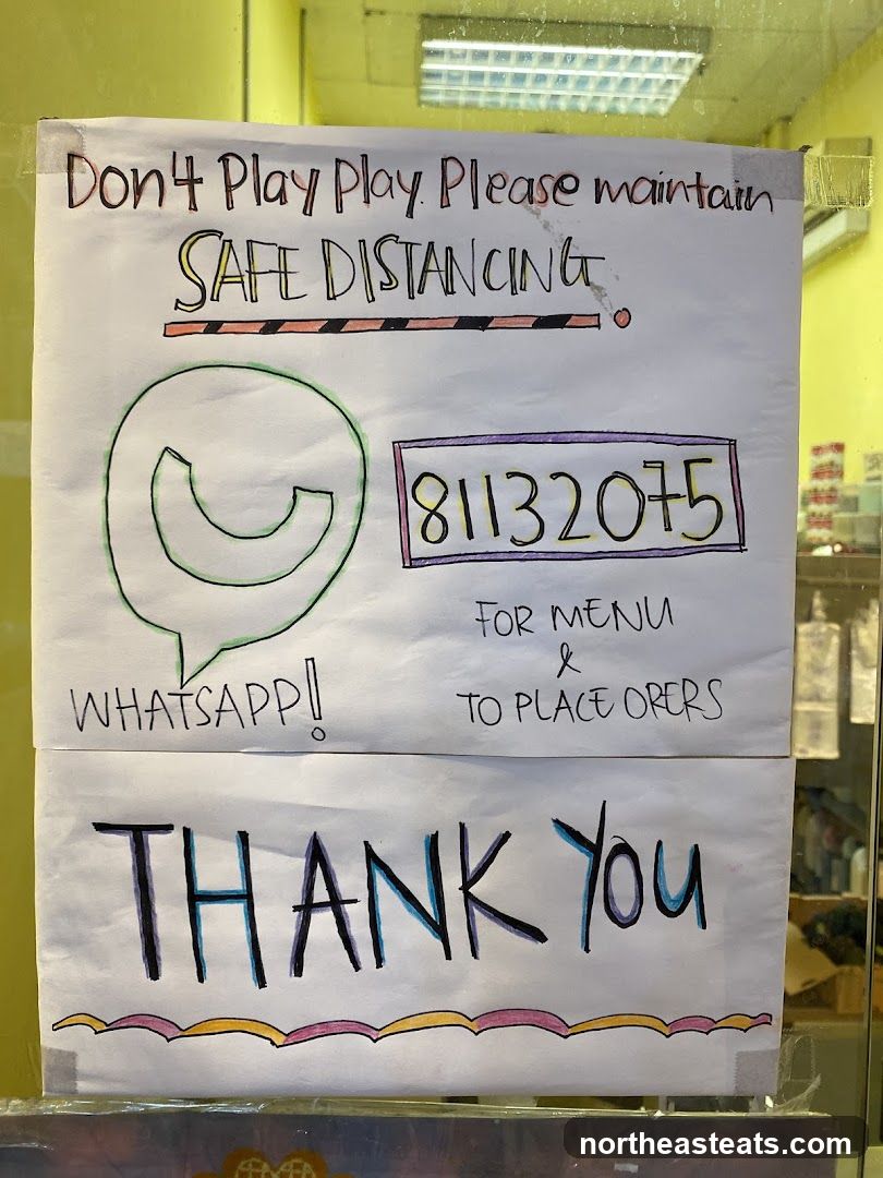 Sign about safe distancing and ordering