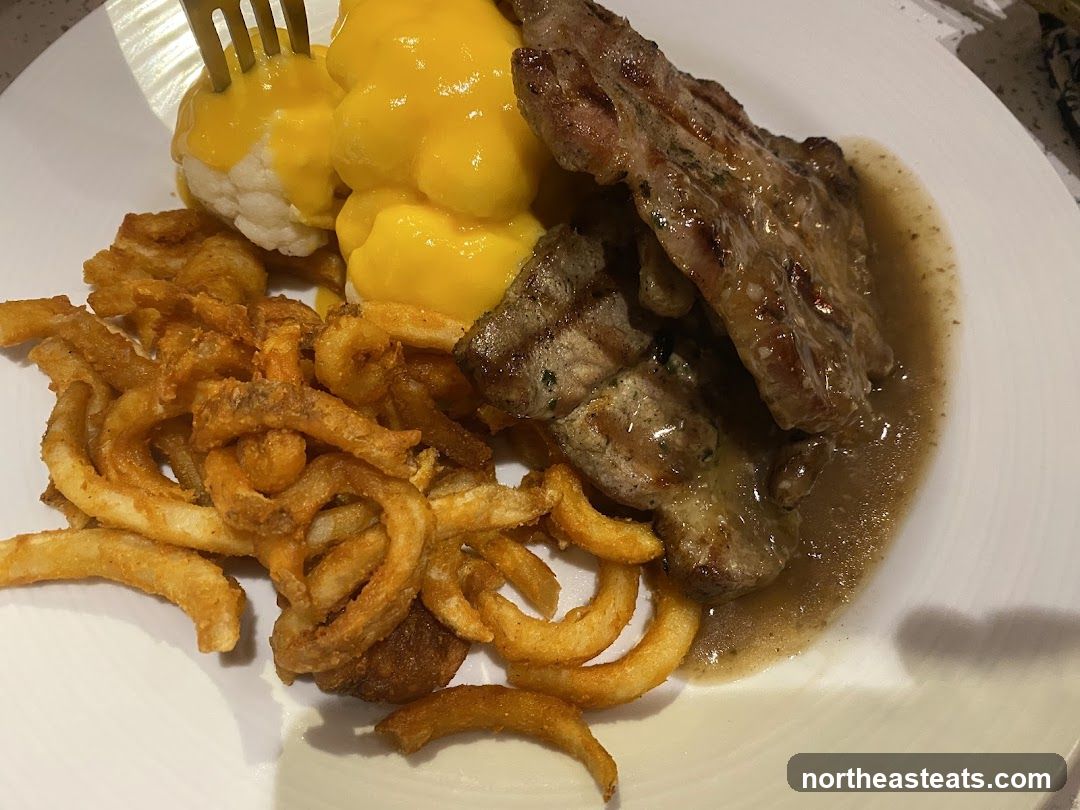 Steak with Curly Fries and Mashed Potatoes