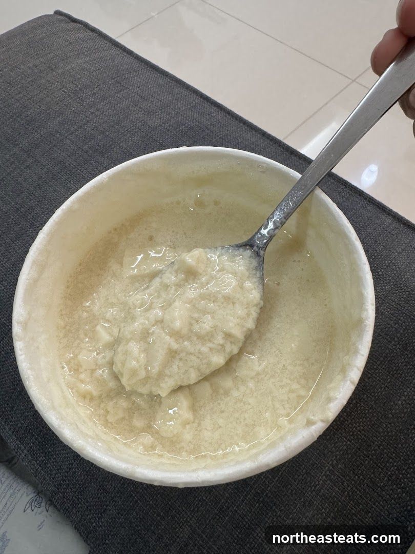Tofu pudding with spoon