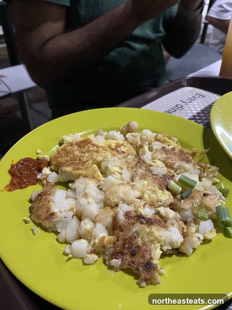 Fried Carrot Cake with Chili Sauce