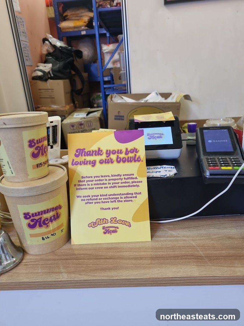 Counter with acai bowls and payment terminals