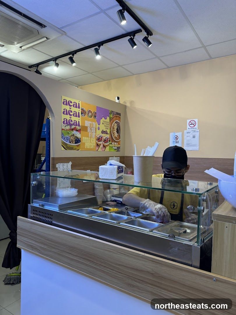 Staff preparing food behind a counter