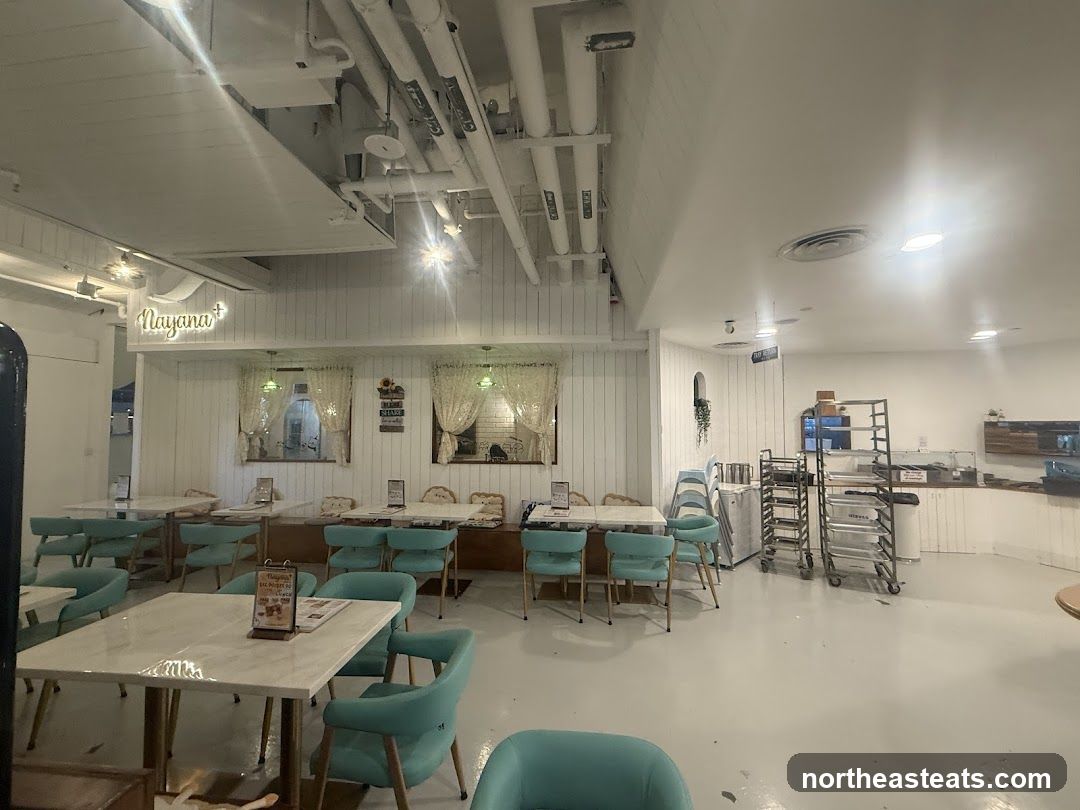 Interior of a cafe with tables and chairs