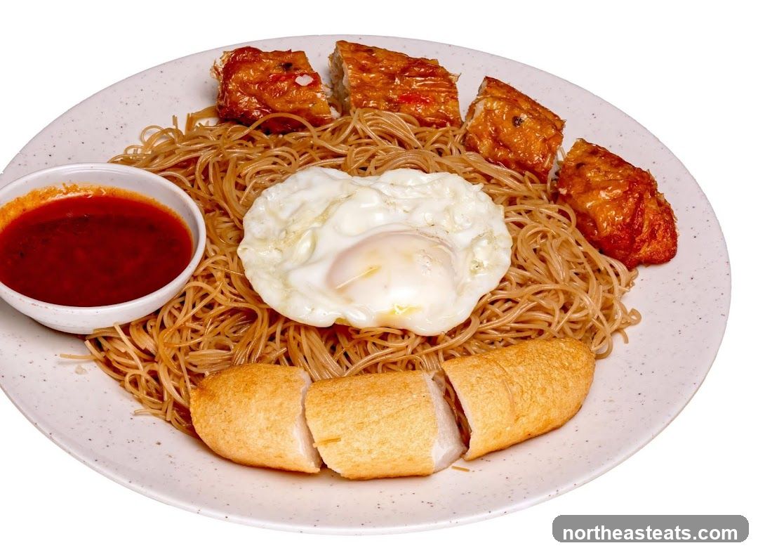 Noodles with Fried Egg and Fish Cakes