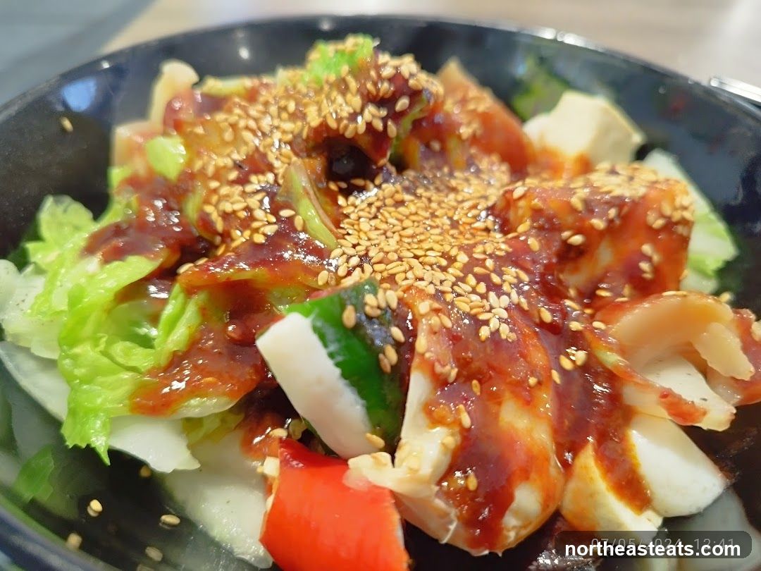 Salad with Sauce and Sesame Seeds