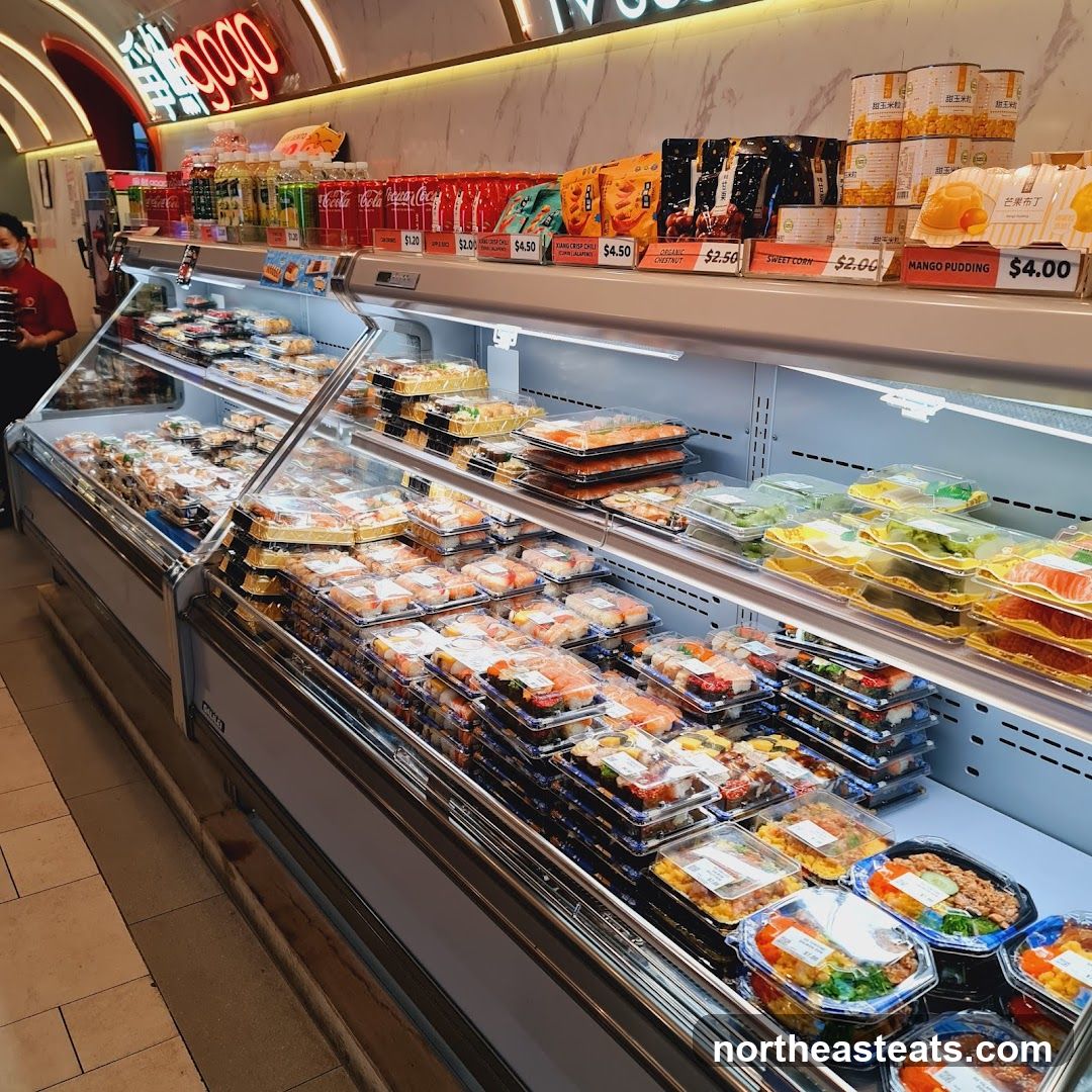 Refrigerated Display Case with Sushi and Snacks
