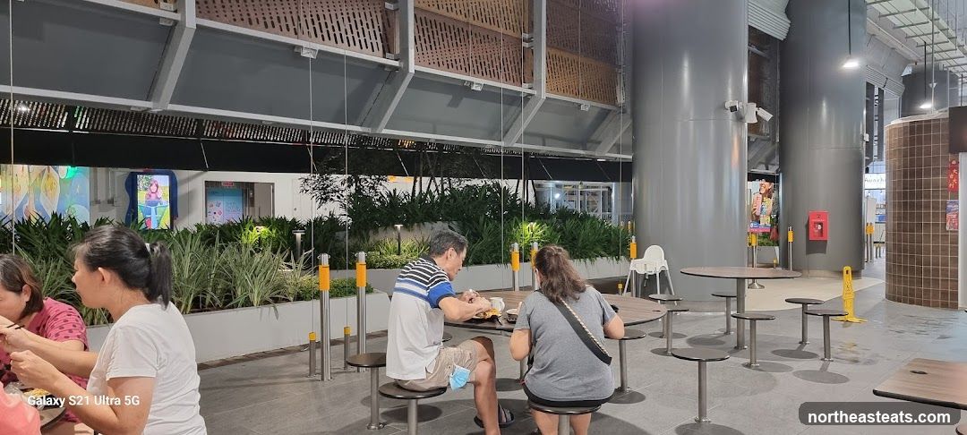 People eating at outdoor tables