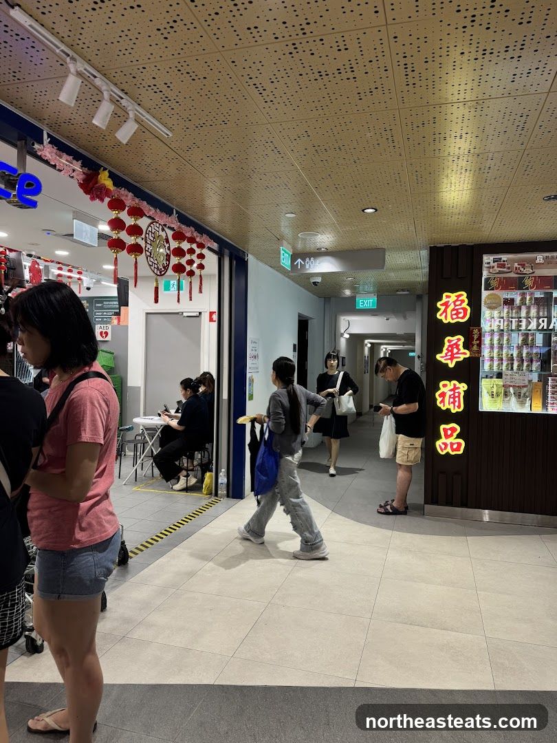 Mall Corridor with Shops and Shoppers
