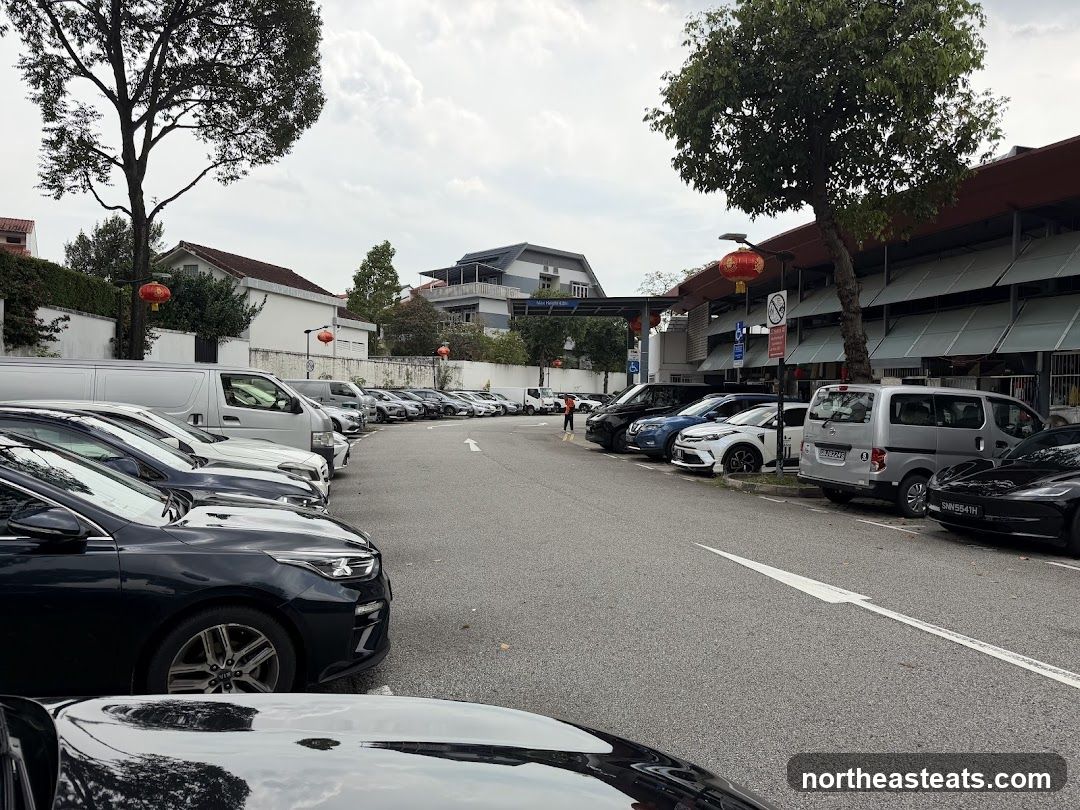 Parking Lot with Cars and Buildings