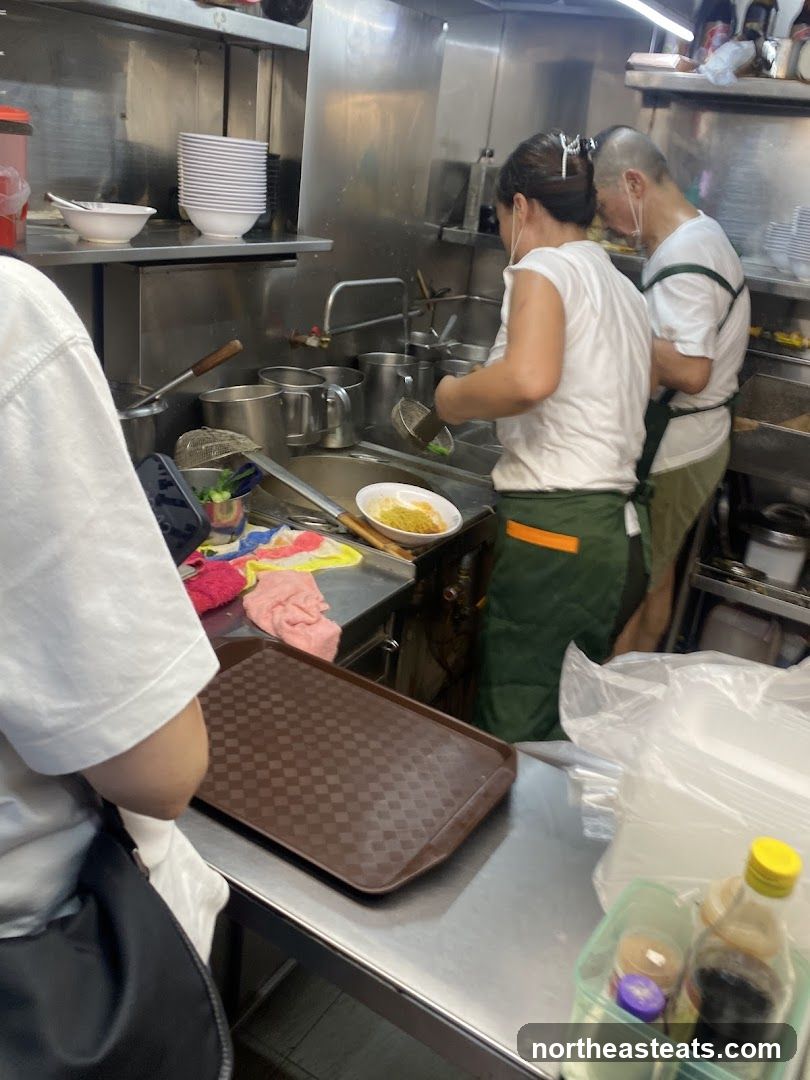 Kitchen Staff Preparing Food