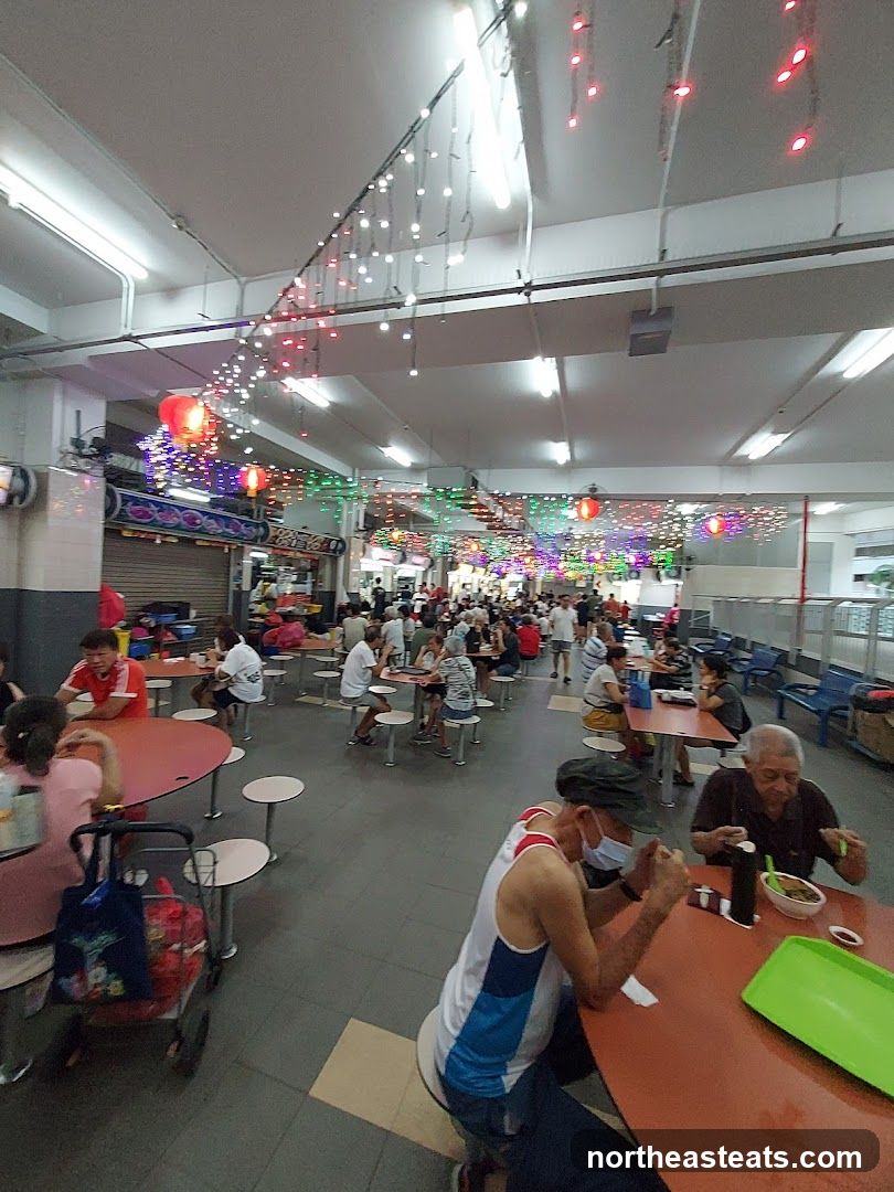 Busy Food Court with Festive Lights