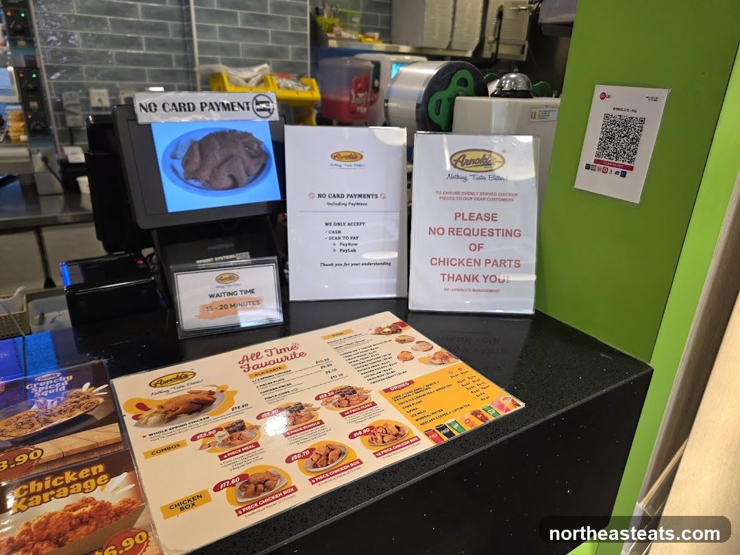 Restaurant counter with menu and payment information