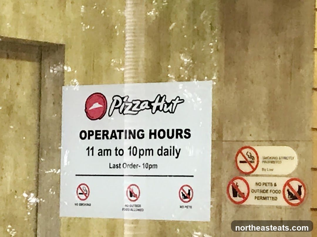 Pizza Hut Operating Hours Sign