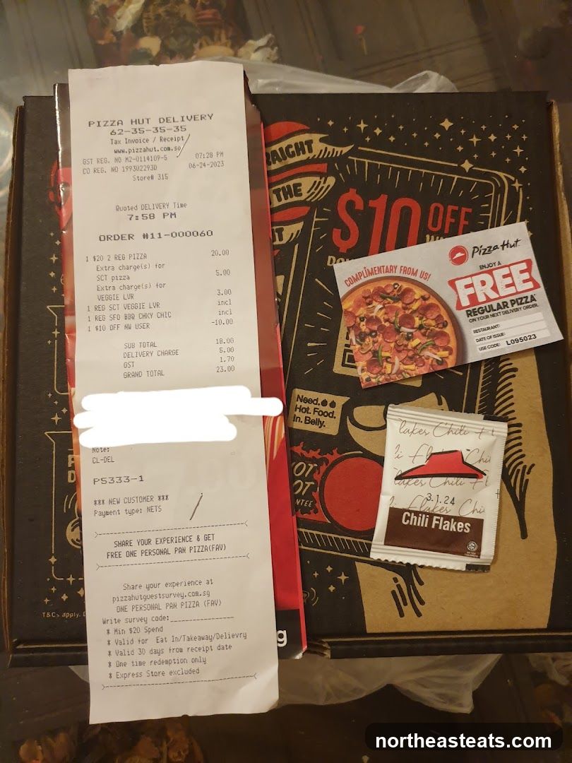 Pizza Hut Delivery Receipt and Promotional Items