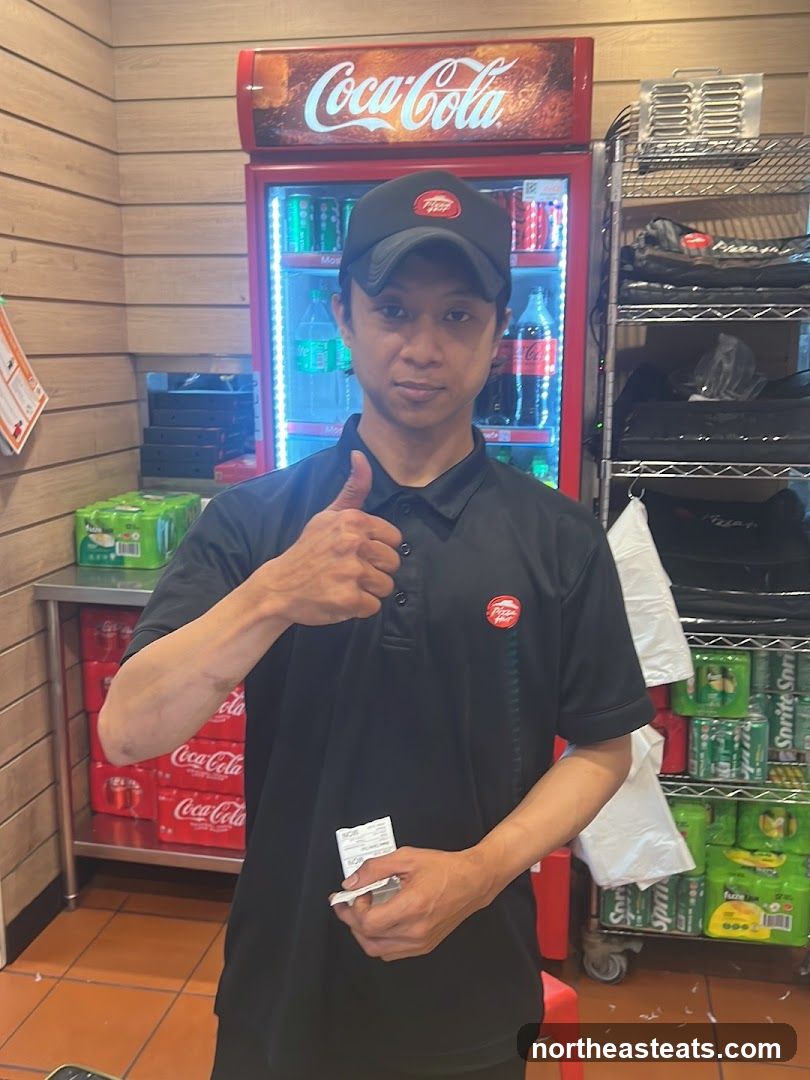 Pizza Hut Employee with Drinks