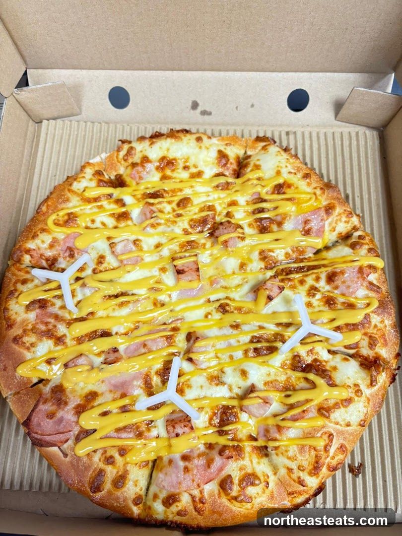 Pizza with cheese and ham