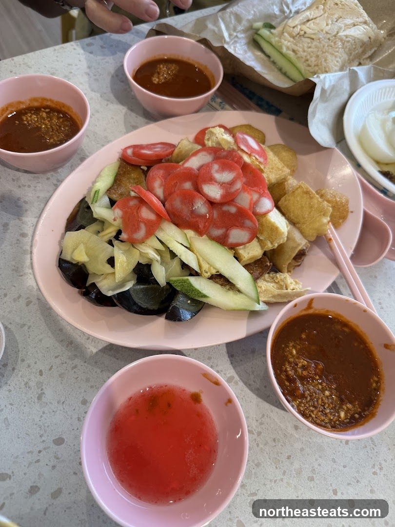 Plate of food with dipping sauces