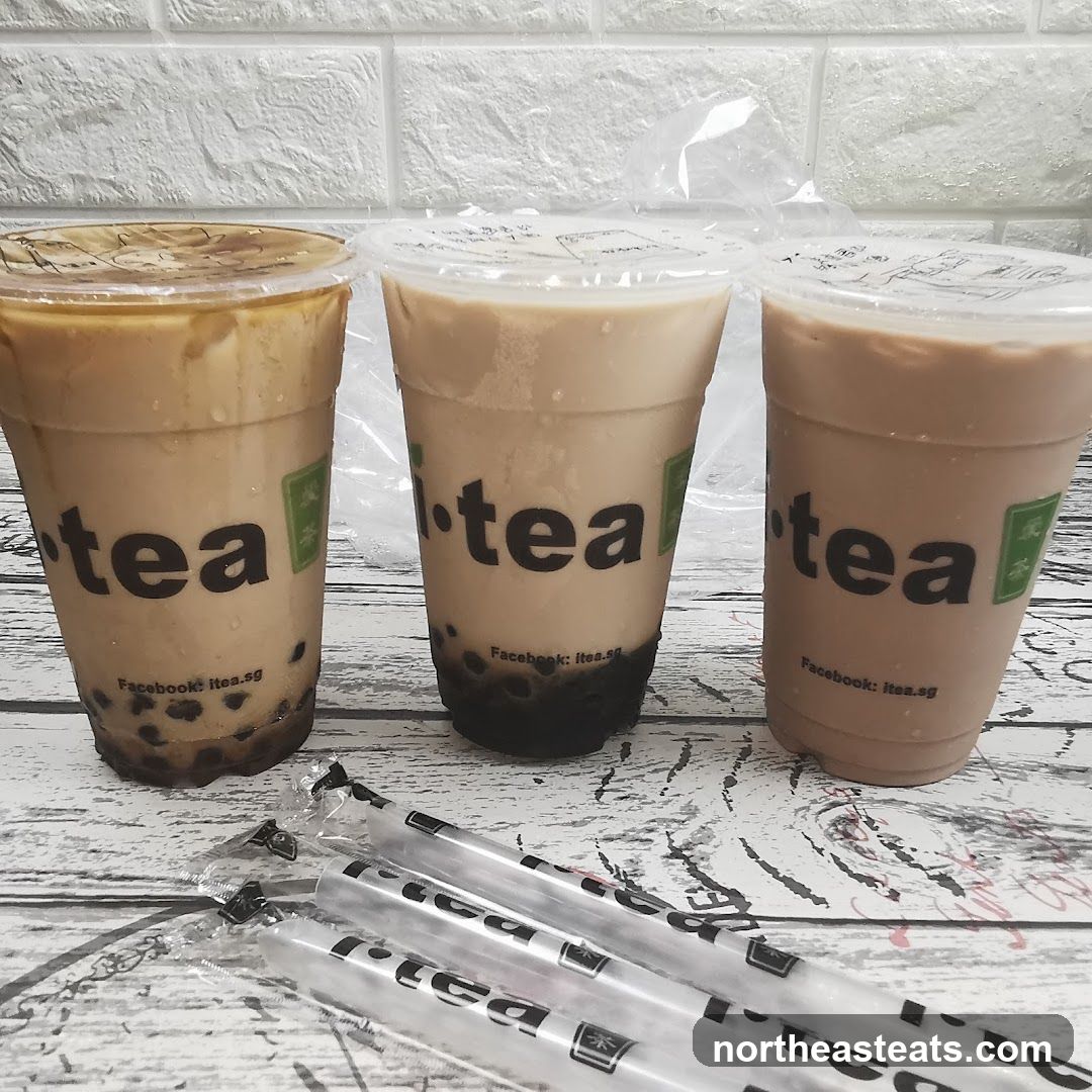 Three bubble tea drinks with straws