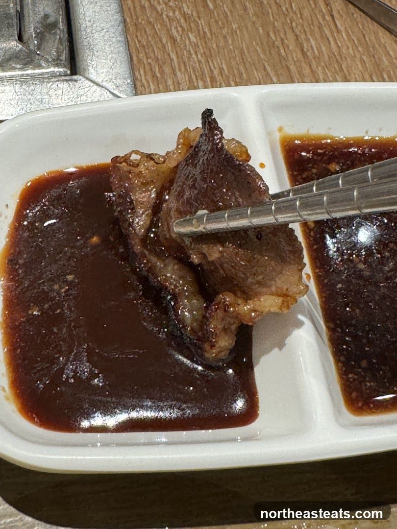 Dipping Meat in Sauce