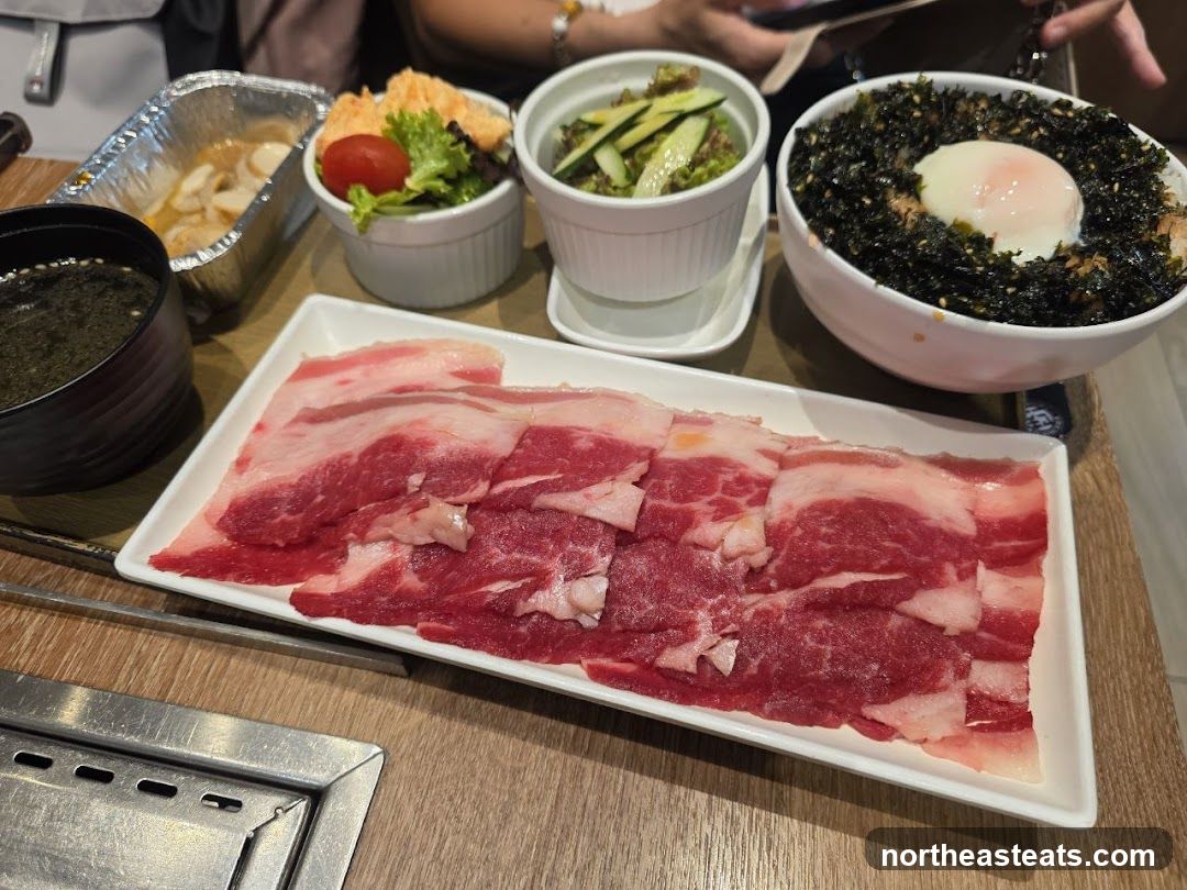 Raw Sliced Beef and Side Dishes