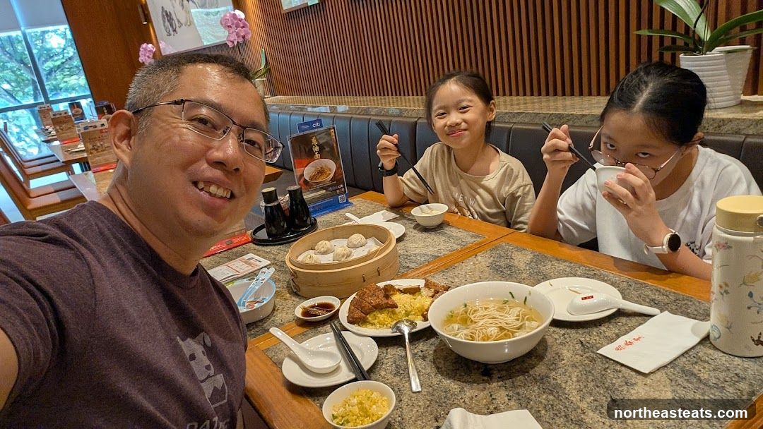 Family enjoying a meal at a restaurant