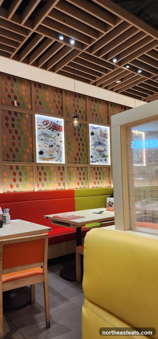 Restaurant Interior with Colorful Booths and Artwork
